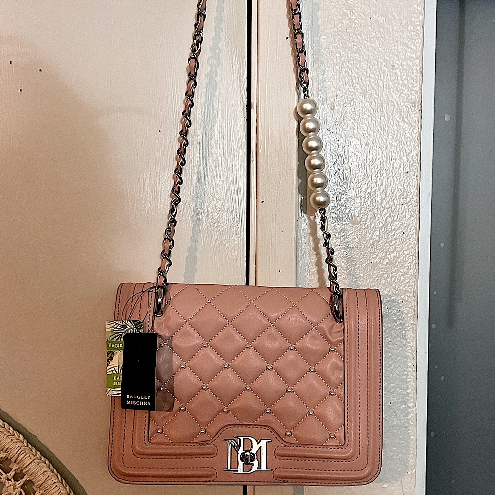 Badgley Mischka pink and pearl crossbody purse.